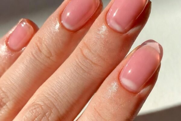 A beautifully curated collection of 17 stunning gel nail ideas applied on natural nails showcasing long-lasting and confidence-boosting manicure designs from sheer pink glass finish and rosewater jelly florals to dusty lavender velvet matte champagne gold chrome black cherry microglitter and pearlescent reverse French tips for effortlessly elevated everyday nail beauty.
