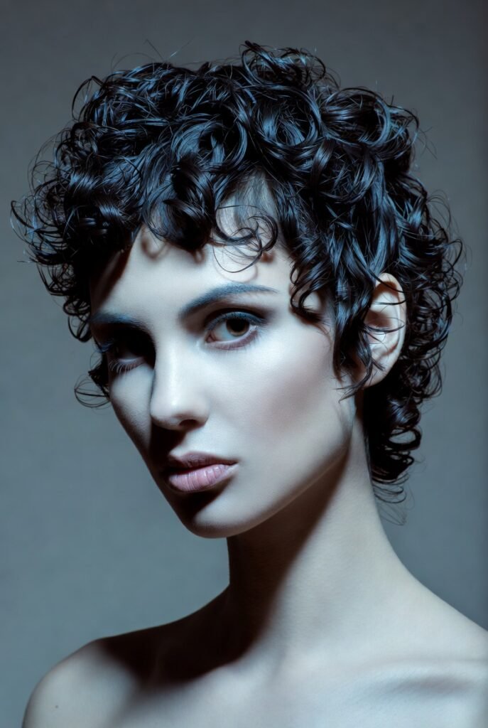 Curly Pixie with Side-Swept Crown: Effortless Volume and Movement