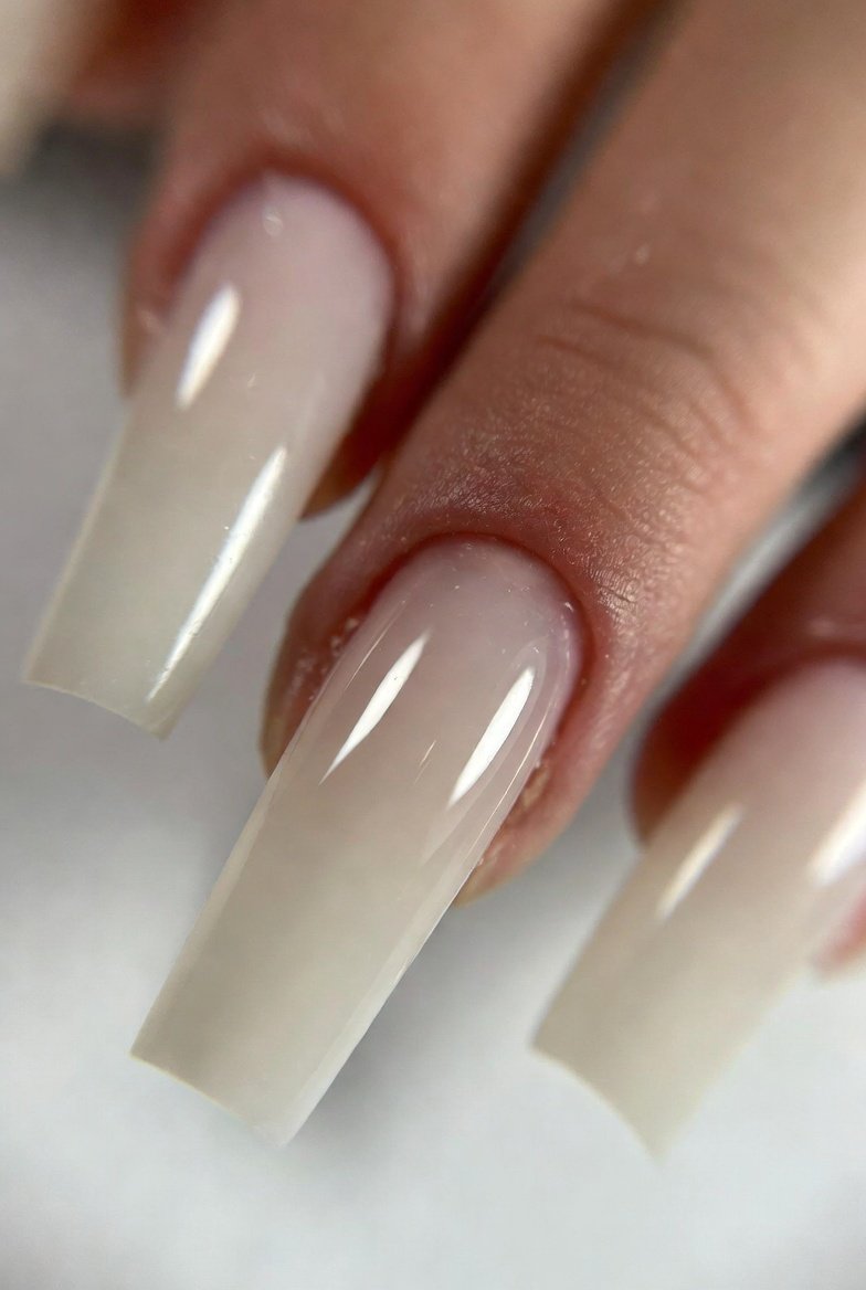 Alt Text: Close-up of 15 stunning acrylic nail designs including Classic French Ombré, Iridescent Chrome, Deep Red Velvet, Blue Lagoon Marble, and Cotton Candy Ombré showcasing long-lasting beautiful acrylic nail styles to elevate your everyday look.