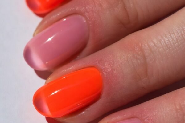 Alt Text: Close-up of 15 stunning jelly nail ideas including Classic Pink, Neon Orange, Ocean Blue, Cherry Red, Black Jelly, Grape Purple, and Clear Confetti showcasing glossy vibrant and fun jelly manicure styles that elevate your nail game with irresistible translucent depth and shine.