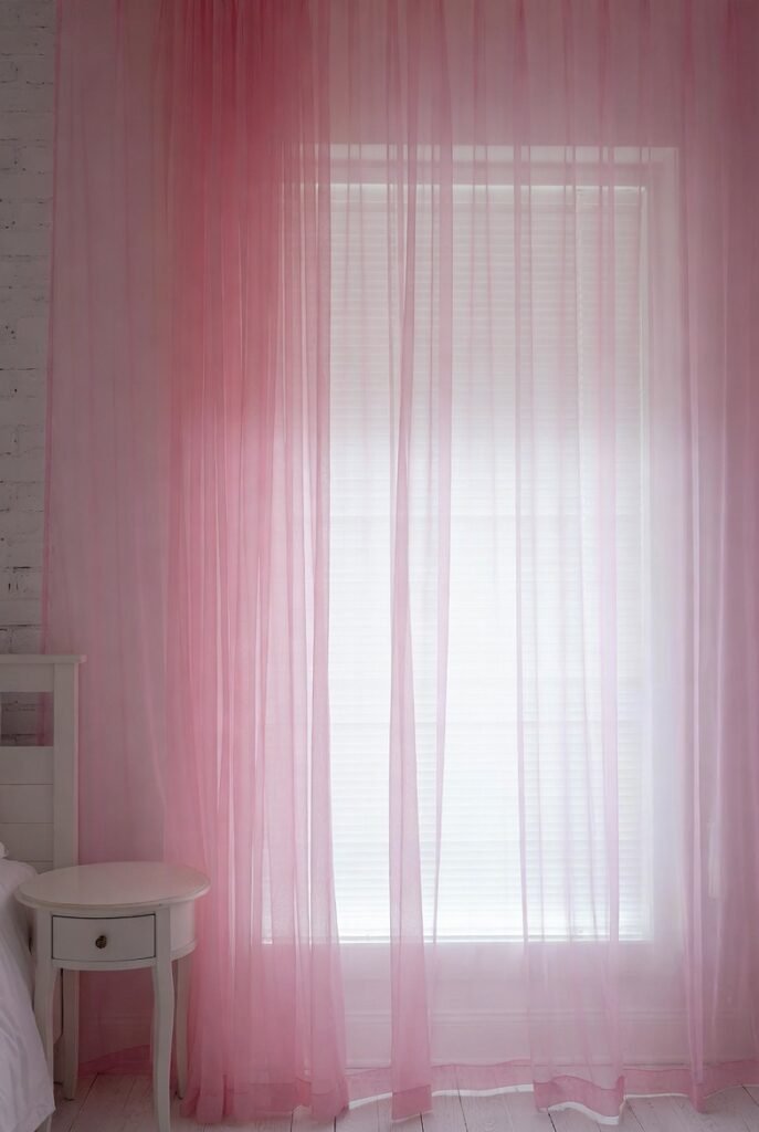 13. Pink Upholstered Bench at the Foot of the Bed