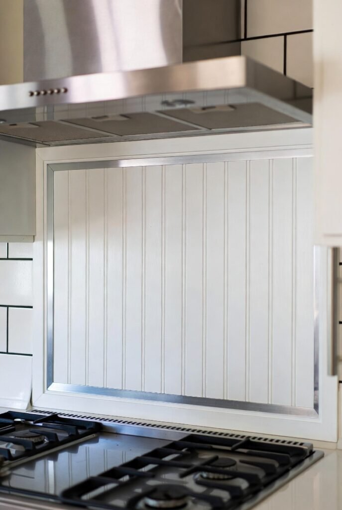 13. Bead Board Backsplash with Stenciled Patterns