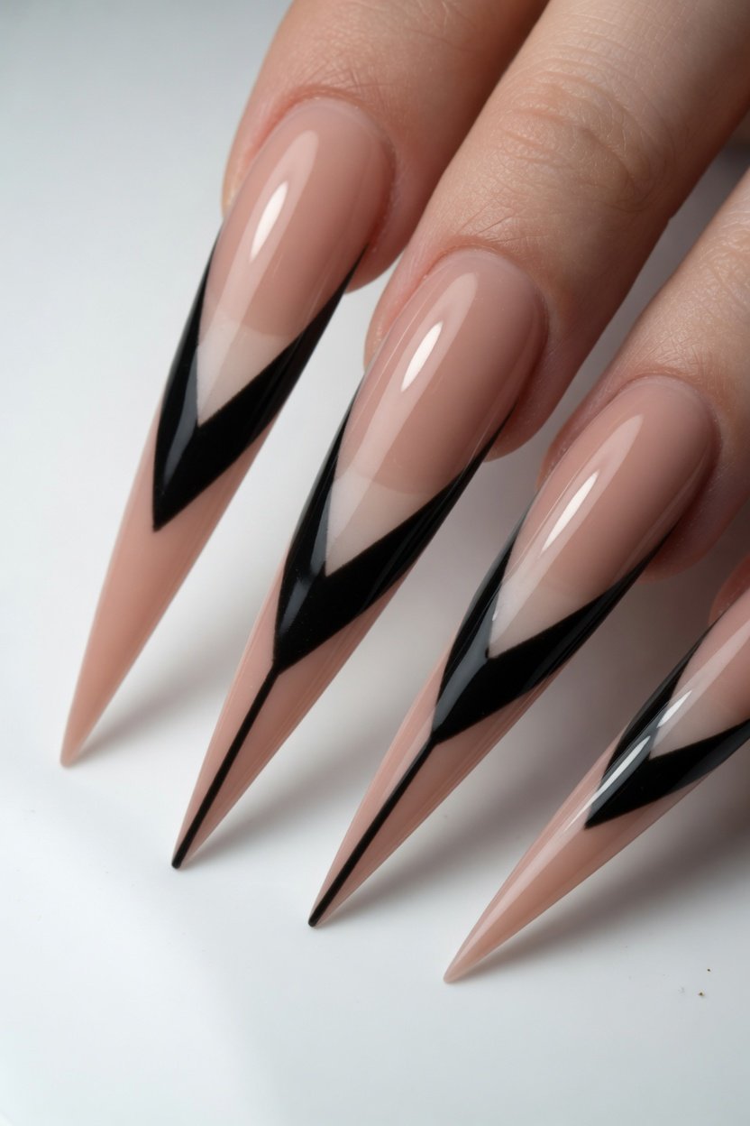 Alt Text: Close-up of 18 creative stiletto nail art ideas including Chrome Mirror, Gothic Velvet Black, Holographic Glitter Fade, Watercolor Florals, and more bold daring stiletto manicure designs for long-lasting gel nails.