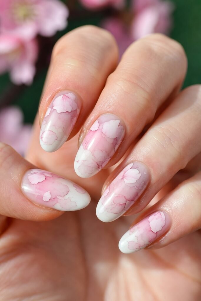 2. Watercolor Wash Sakura Nails
