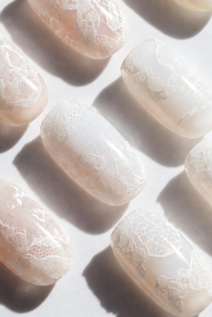 10. Lace and Mesh Patterns Stamped in White: Delicate Texture