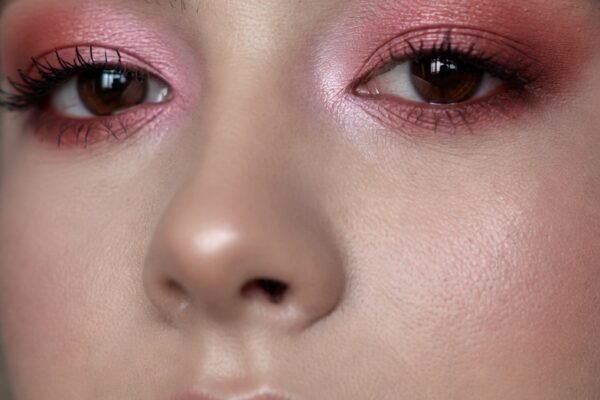A breathtakingly romantic and wearable collection of 18 stunning pink eyeshadow looks showcasing a beautifully made-up woman featuring the most flattering and versatile pink eye makeup ideas from soft everyday blush shimmer and dusty rose matte blends to bold fuchsia cut creases sparkling glitter toppers warm rose gold halo eyes and deep plum pink smoky looks for the ultimate elevated and feminine eye makeup that unlocks your most romantic and confidently beautiful side.