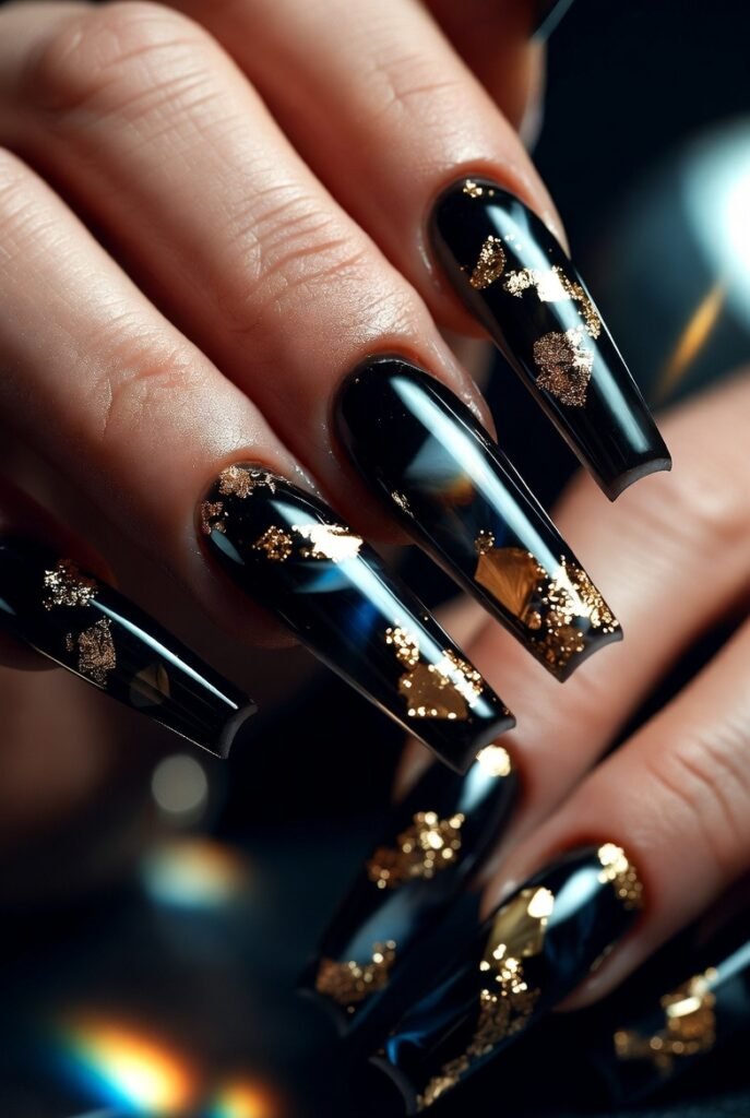 2. Glossy Black Coffin Nails with Gold Foil
